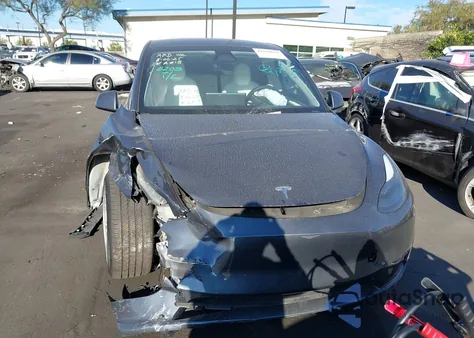 2023 Tesla Model Y Awd/Long Range Dual Motor All-Wheel Drive из США, поврежденный, VIN 7SAYGDEE4PF903647